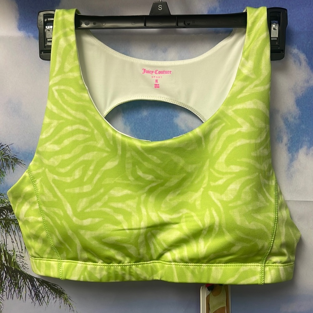 Brand new with tags Woman’s Juicy Couture Sport - Z-pop bra. Size is X-large.